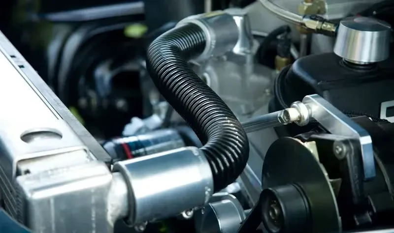 engine bay illustrating sound waves representing gurgling or rumbling from cooling system issues