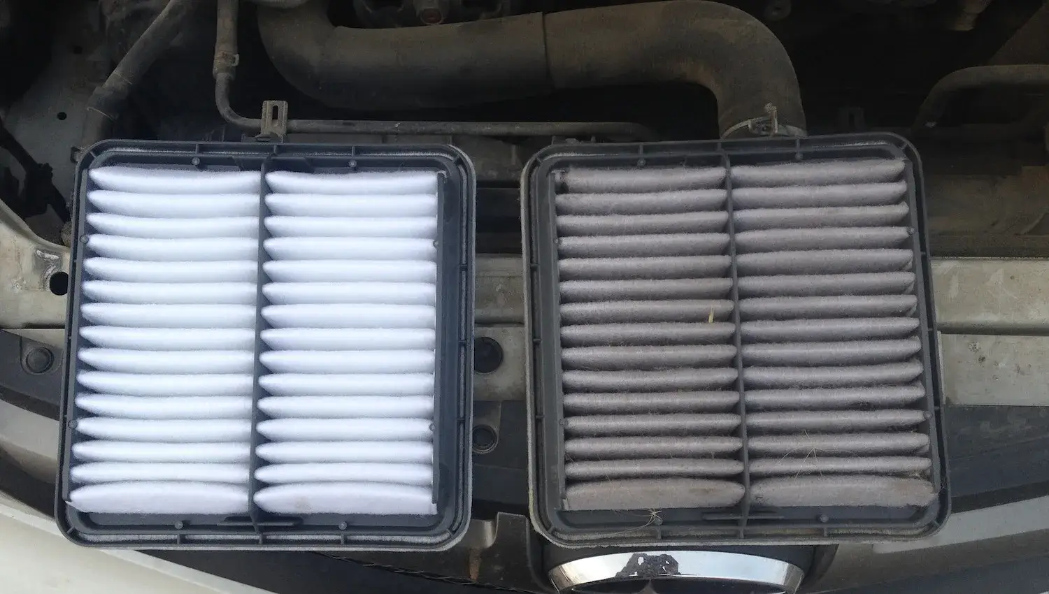 comparison of clean and dirty car engine air filters