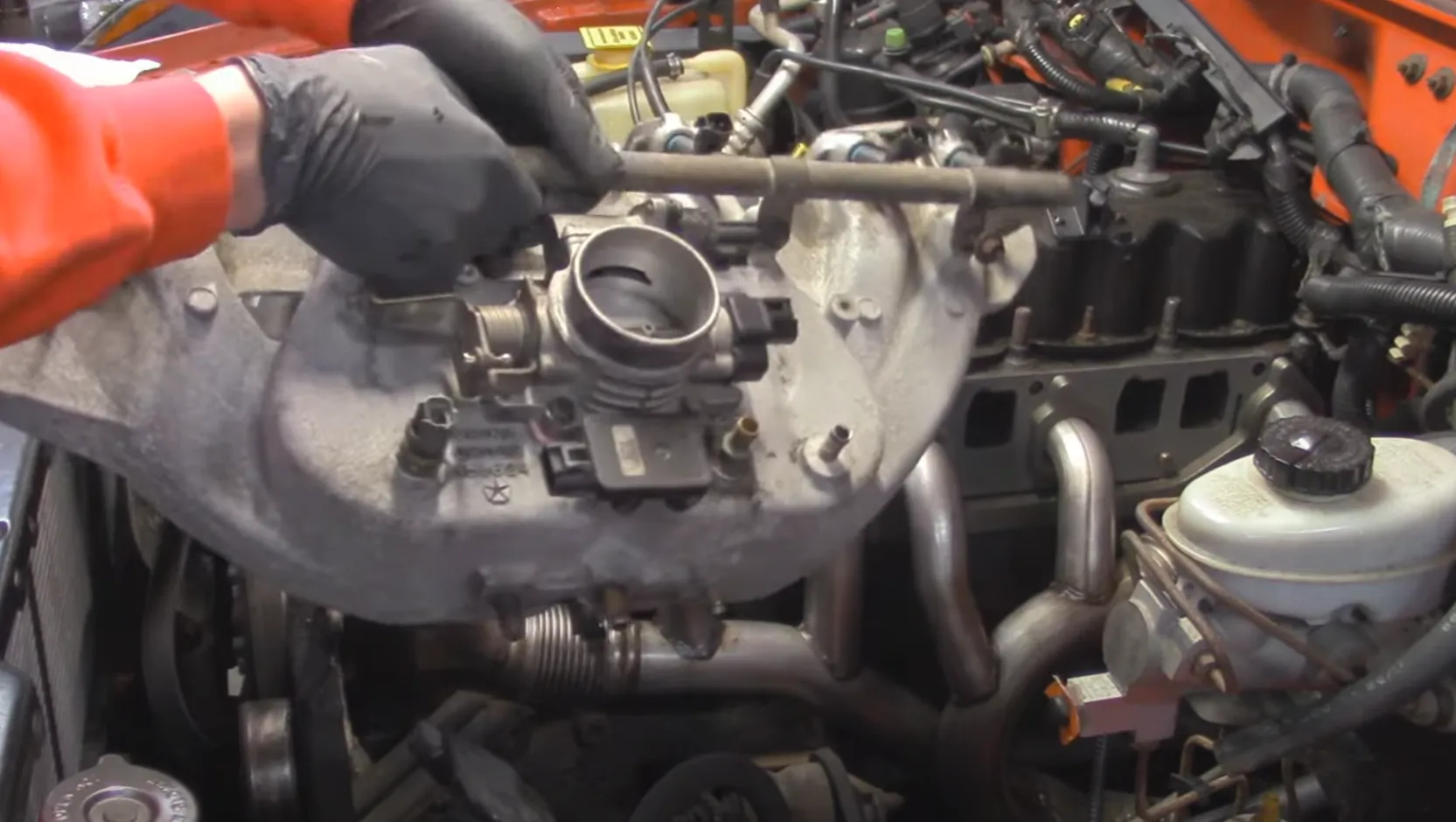 step by step overview of exhaust manifold removal and installation process